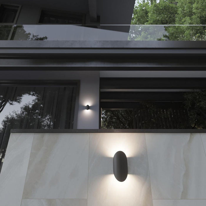 Remy Outdoor LED Wall Light in Outside Area.