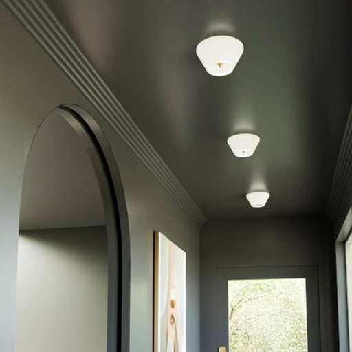 Holt LED Flush Mount Ceiling Light in hallways.