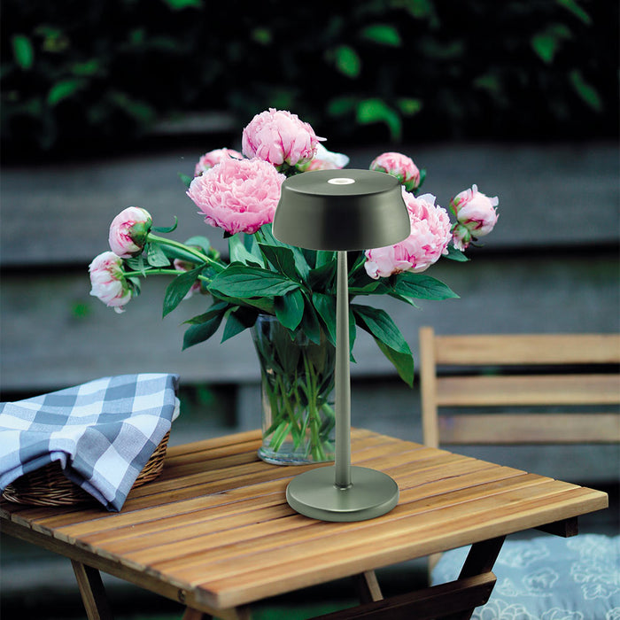 Sister LED Portable Table Lamp in Outside Area.