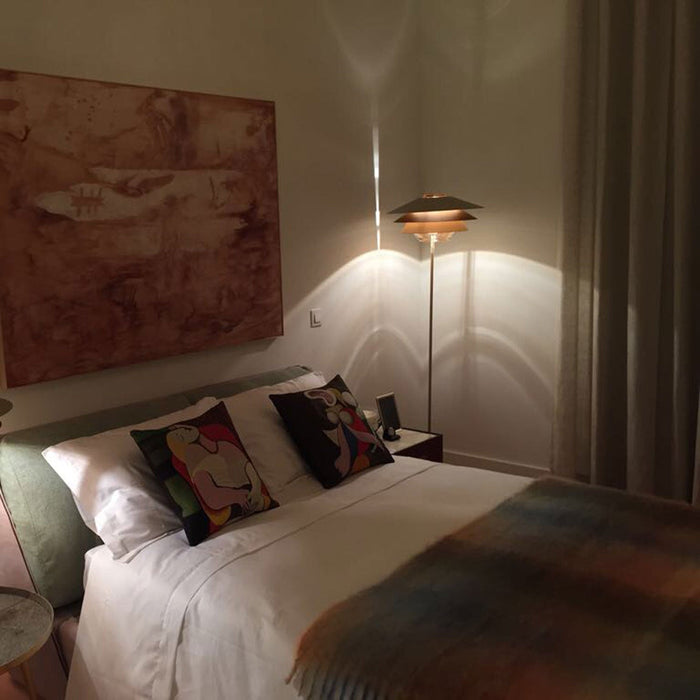 Overlay F Floor Lamp in bedroom.