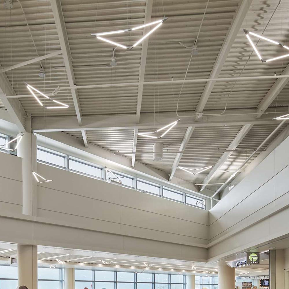 Z-Bar Bird LED Pendant Light in station.