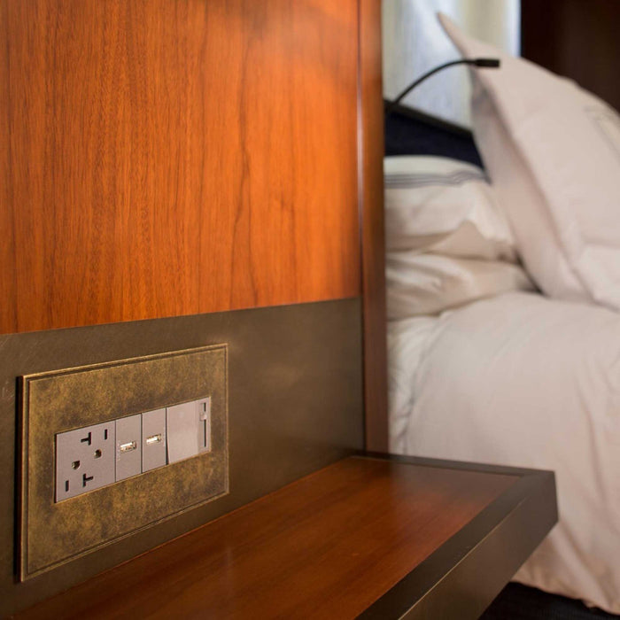 adorne® Hubbardton Forge Wall Plates in bedroom.