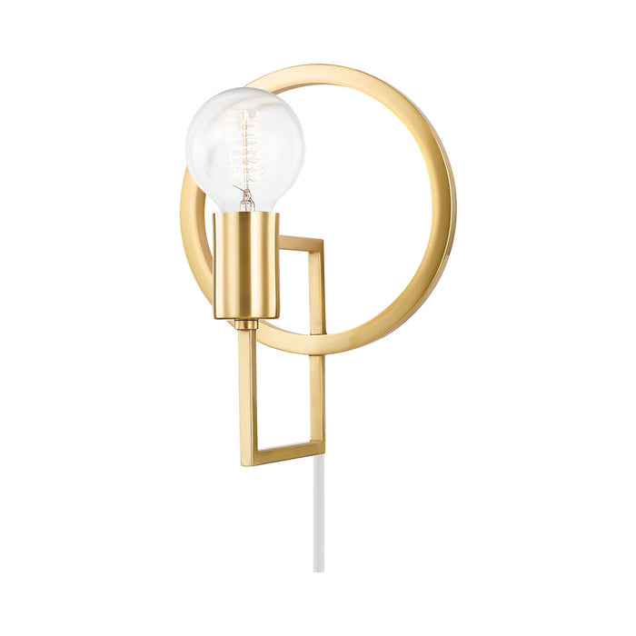 Tory Plug-In Wall Light in Aged Brass.