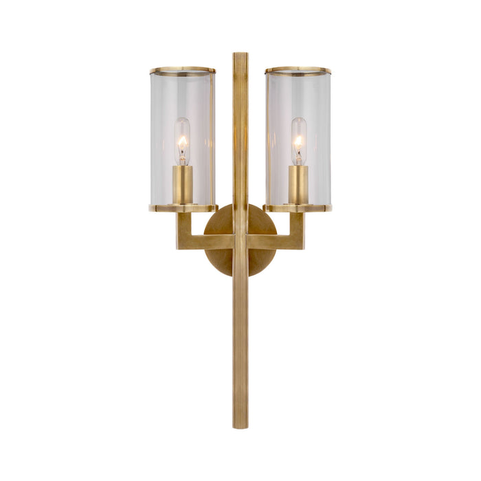 Liaison Double Wall Light in Antique-Burnished Brass/Clear.