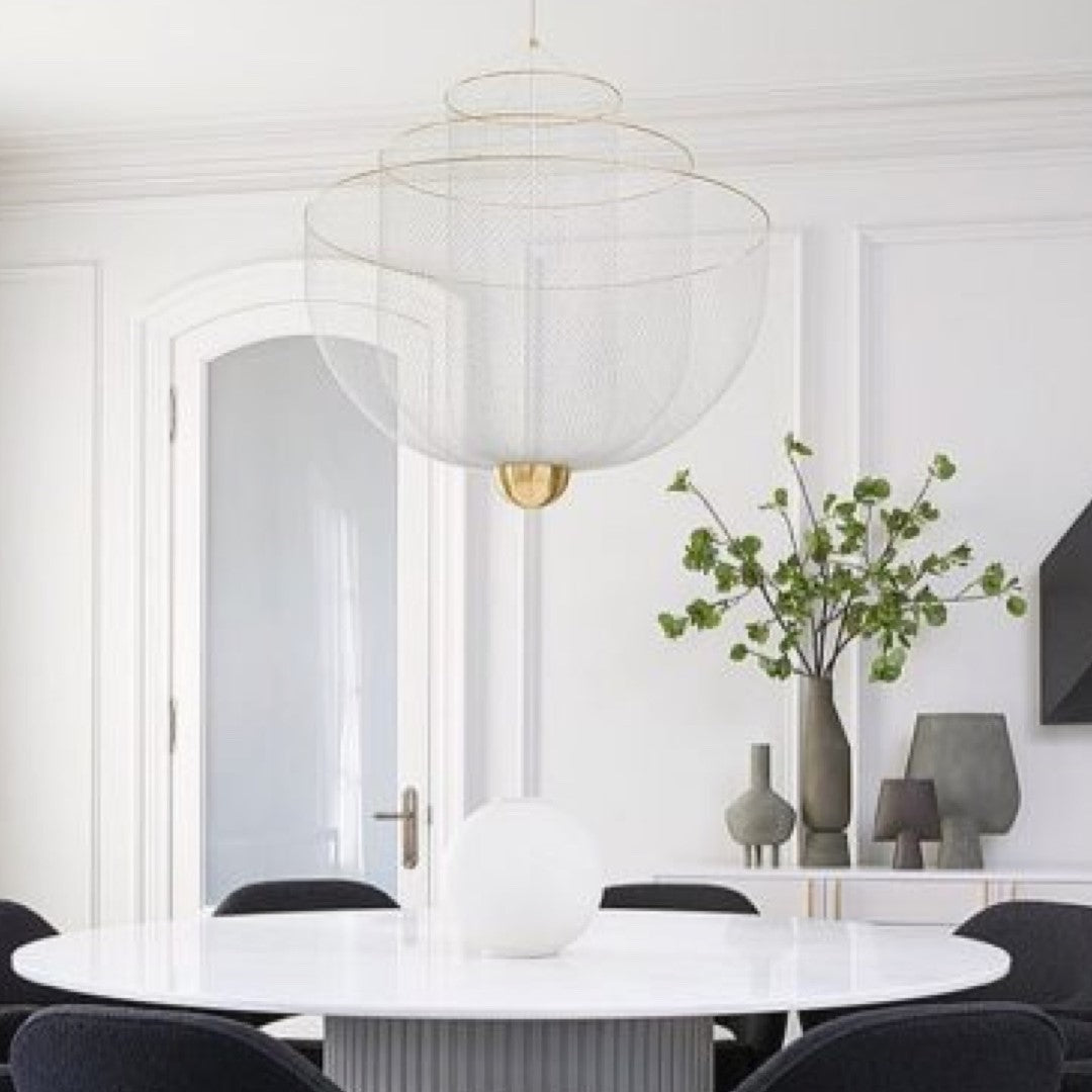 Chandelier over dining room table