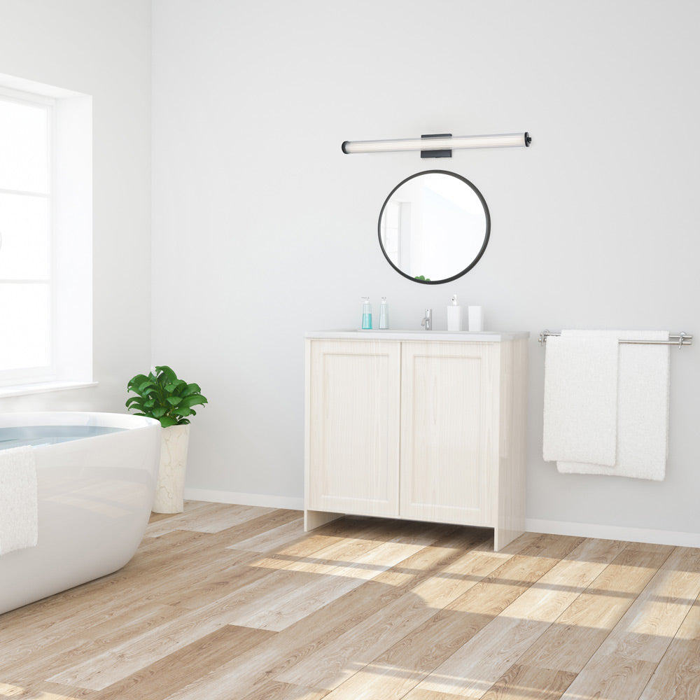 Macie Fluted LED Bath Vanity Light in bathroom.
