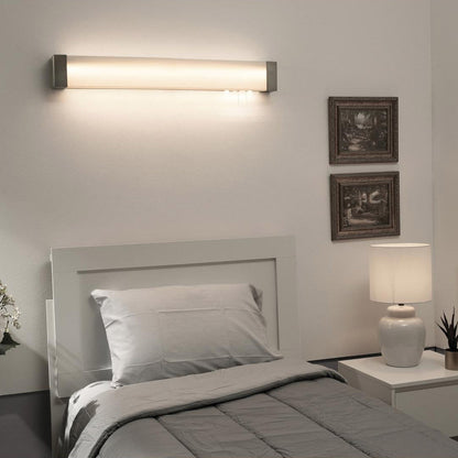 Algiers LED Overbed Wall Light in bedroom.