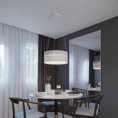 Ash Round LED Pendant Light in living room.