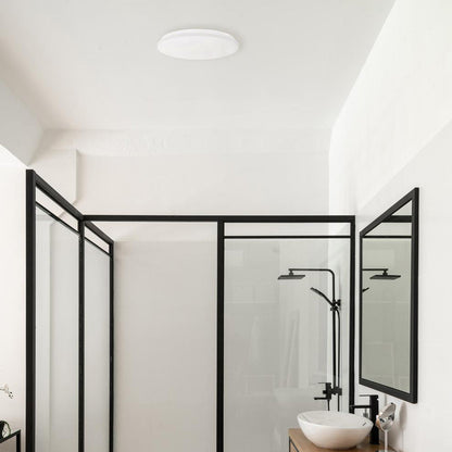 Aurora LED Flush Mount Ceiling Light in bathroom.