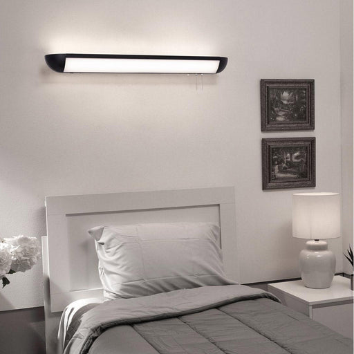 Clairemont LED Wall Light in bedroom.