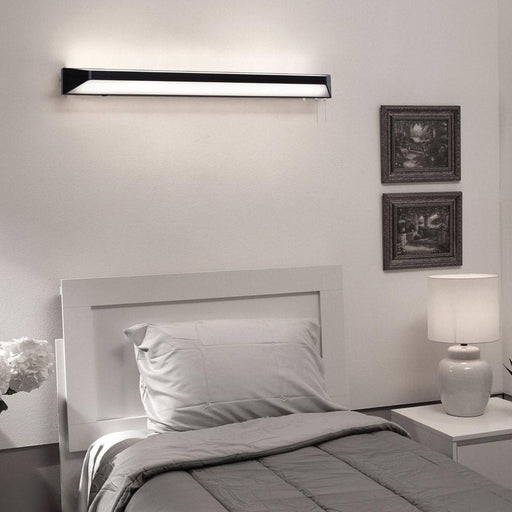 Cory LED Wall Light in bedroom.