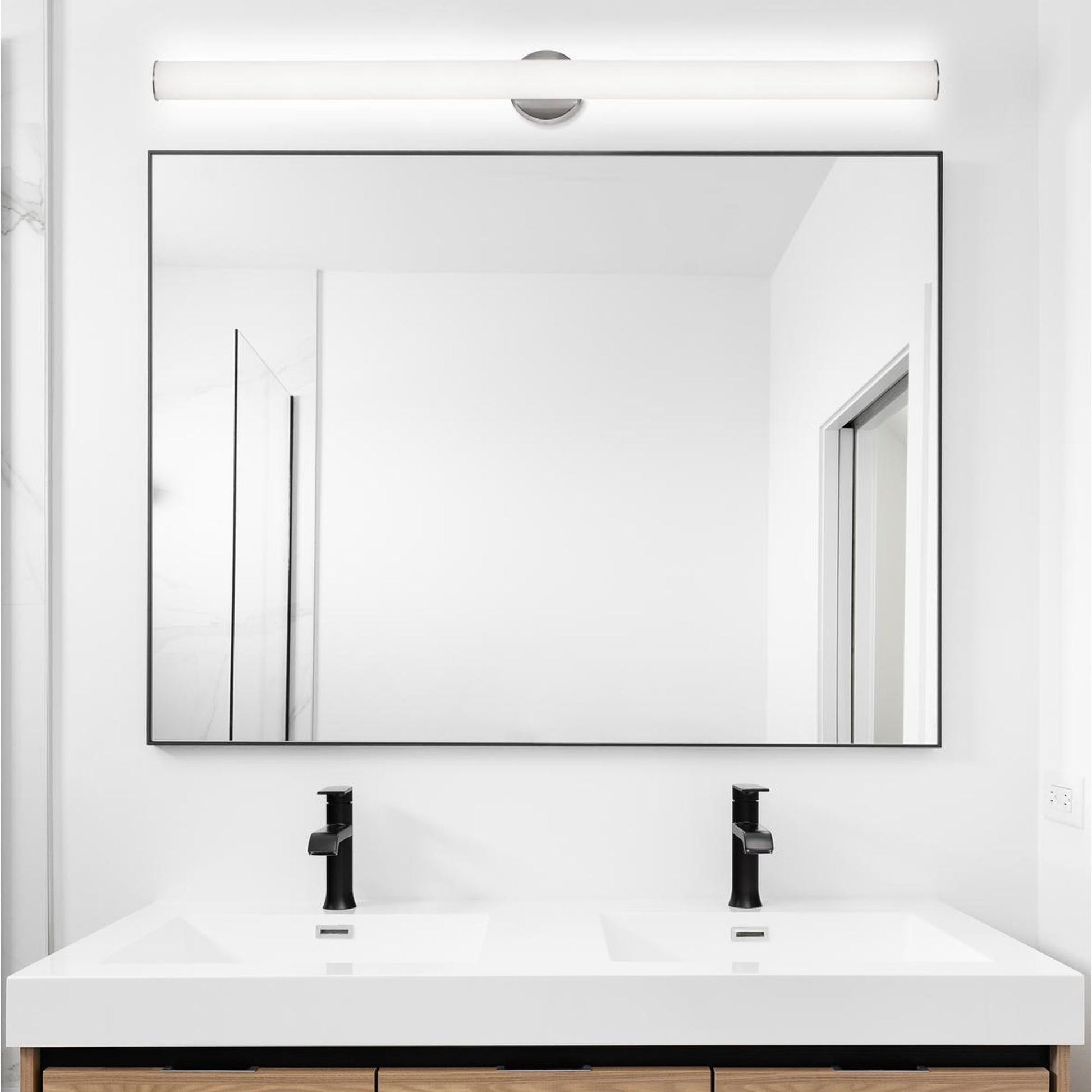 Leia LED Vanity Wall Light in bathroom.