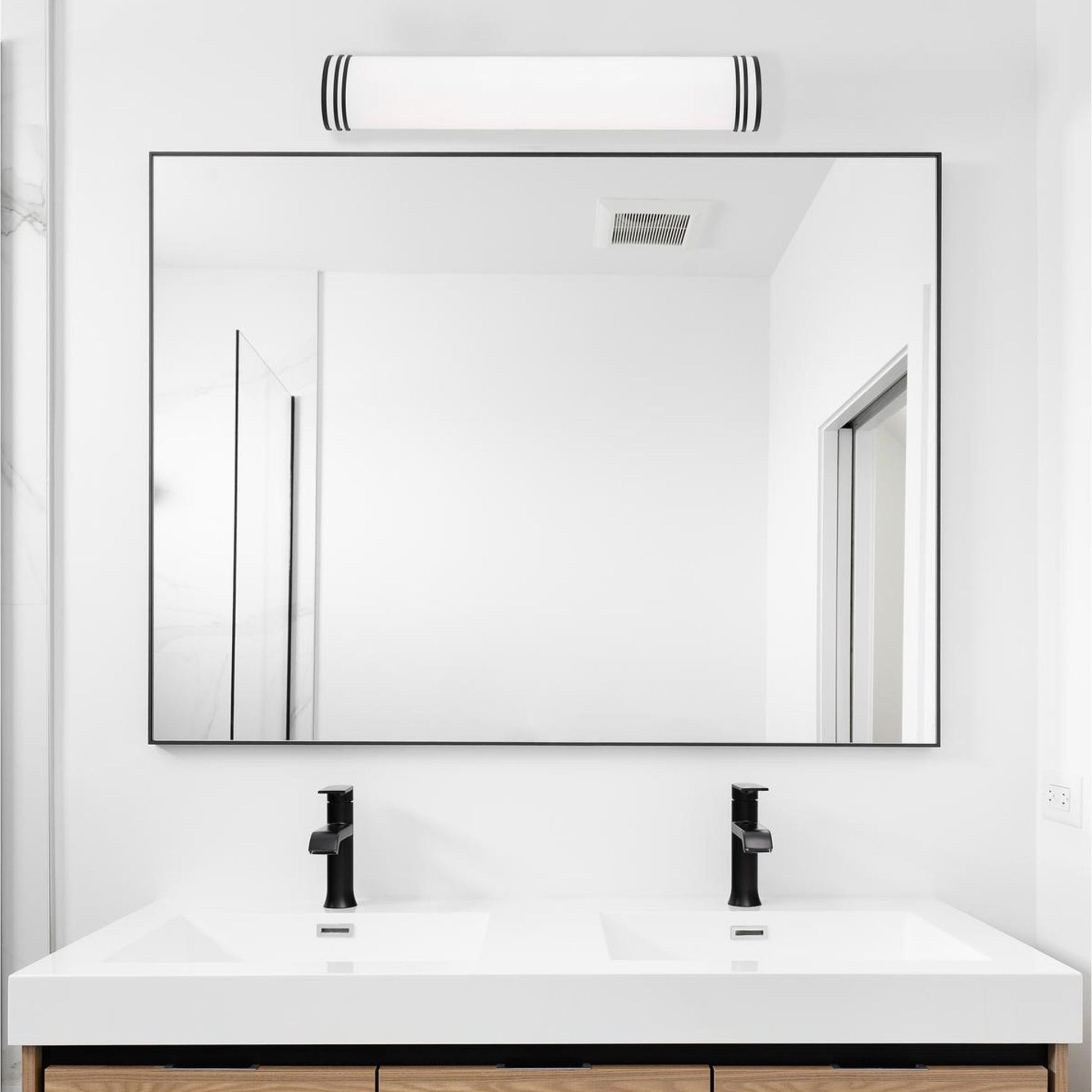 Palmer LED Vanity Wall Light in bathroom.