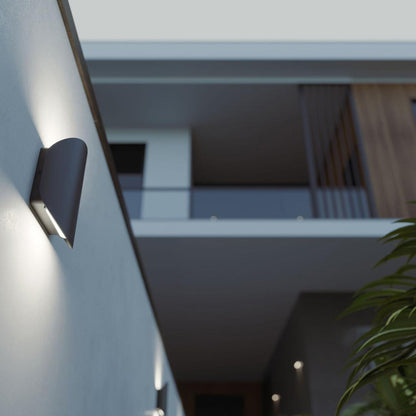 Remy Outdoor LED Wall Light in Outside Area.