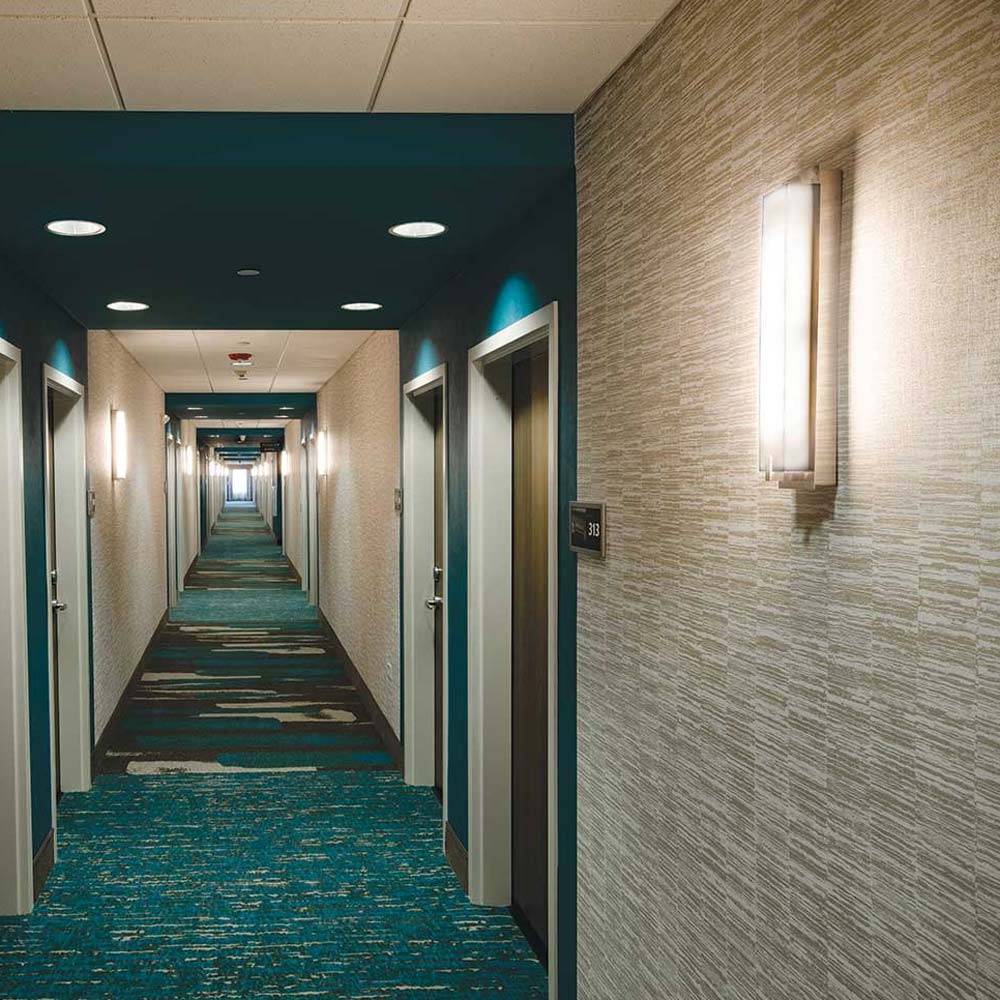 Sinclair LED Wall Light in hallway.