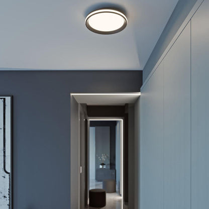 Sona LED Flush Mount Ceiling Light in living room.