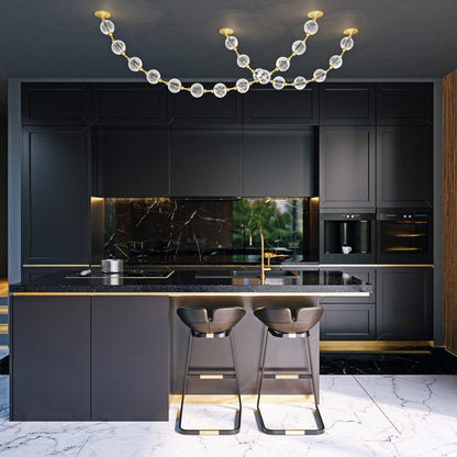 Marni LED Sphere Pendant Light in kitchen.