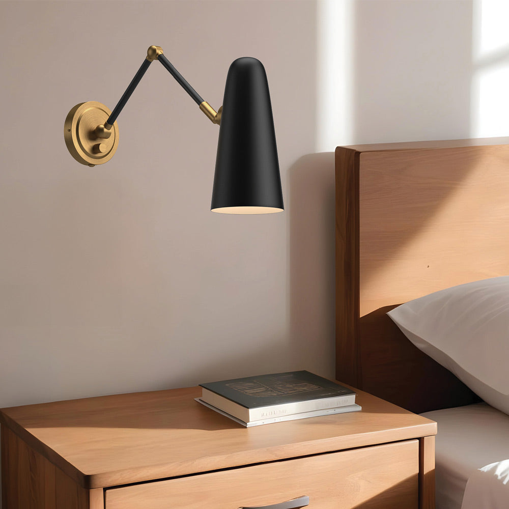 Daniel Adjustable Wall Light in bedroom.