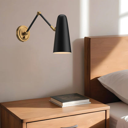Daniel Adjustable Wall Light in bedroom.