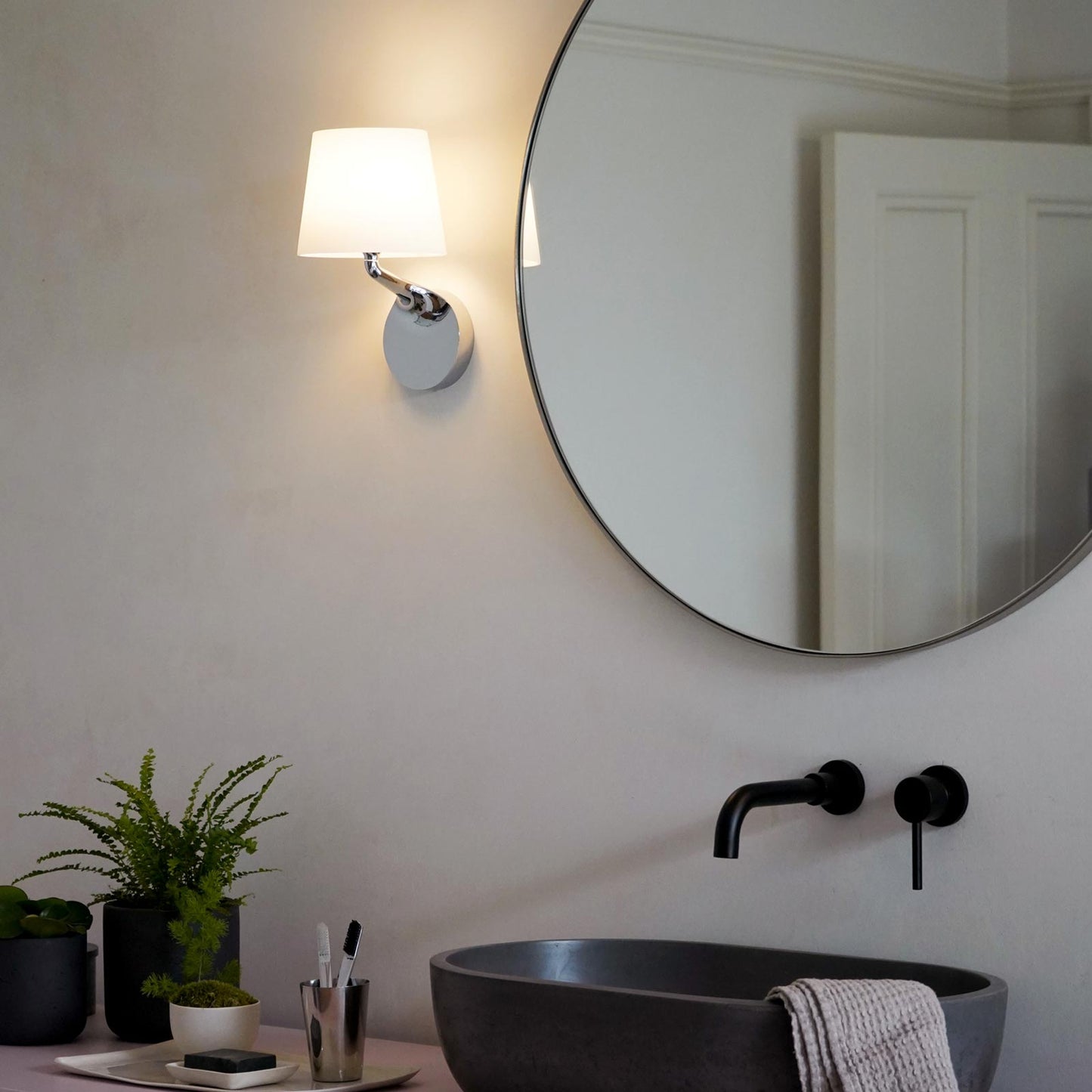 Millie Wall Light in bathroom.