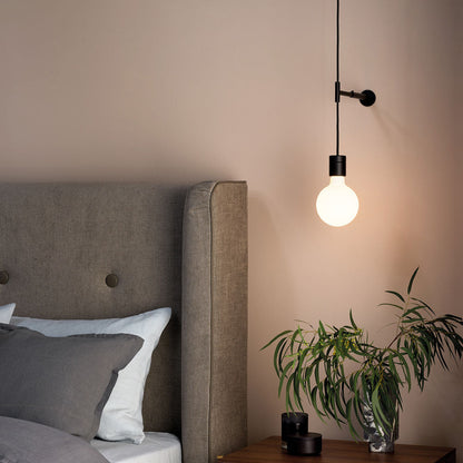 Tacoma LED Pendant Light With Wall Kit in bedroom.