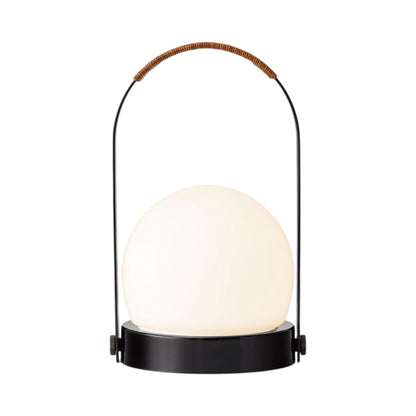 Carrie Outdoor LED Rechargeable Table Lamp in Black/Leather-wrapped.