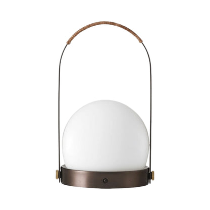 Carrie Outdoor LED Rechargeable Table Lamp in Bronzed Brass/Leather-wrapped.