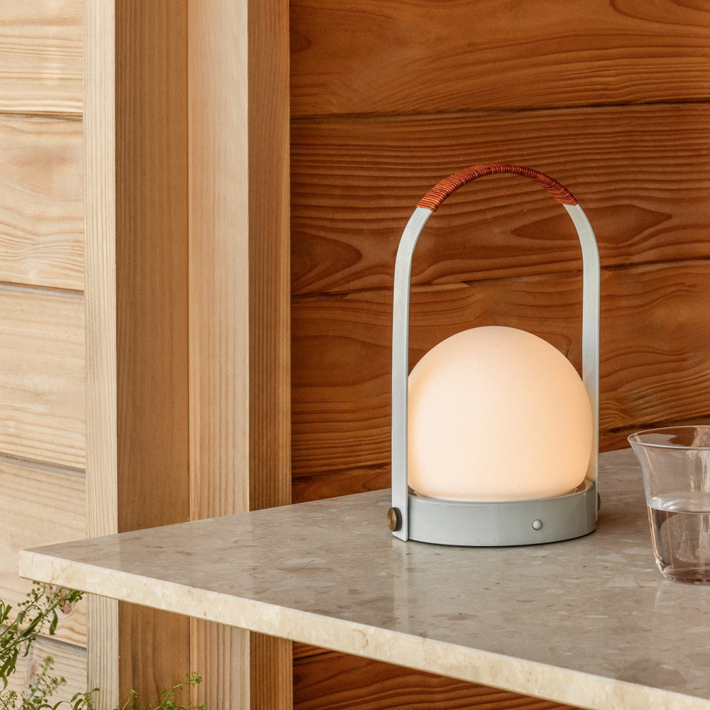 Carrie Outdoor LED Rechargeable Table Lamp in Outside Area.