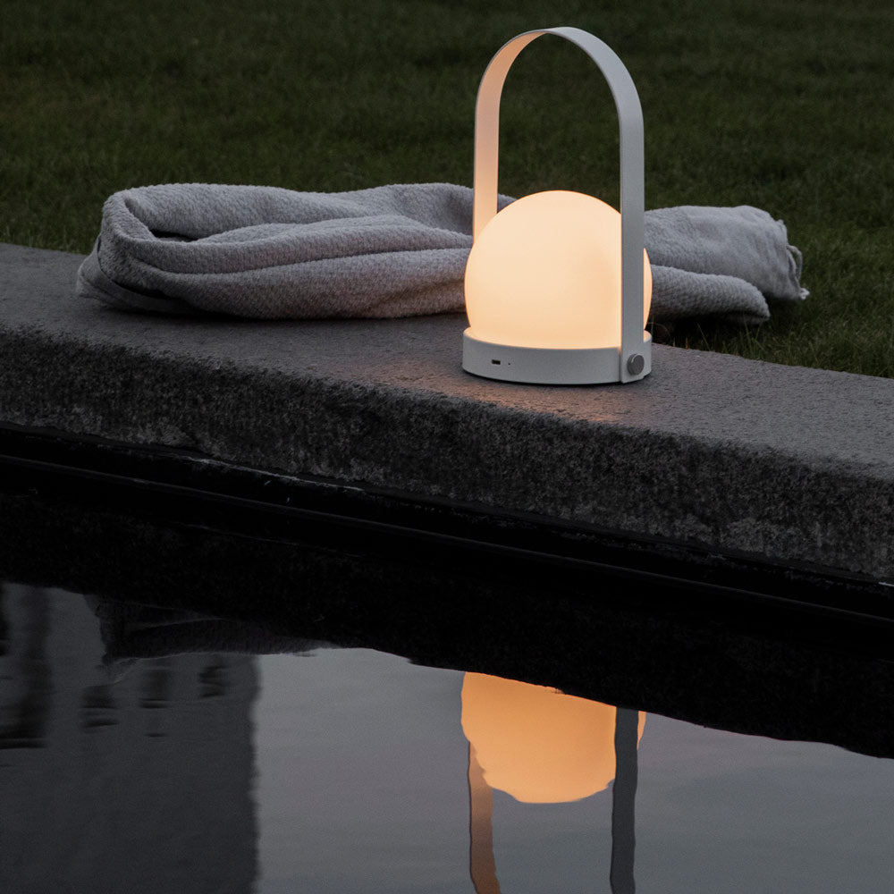 Carrie Outdoor LED Rechargeable Table Lamp in Outside Area.