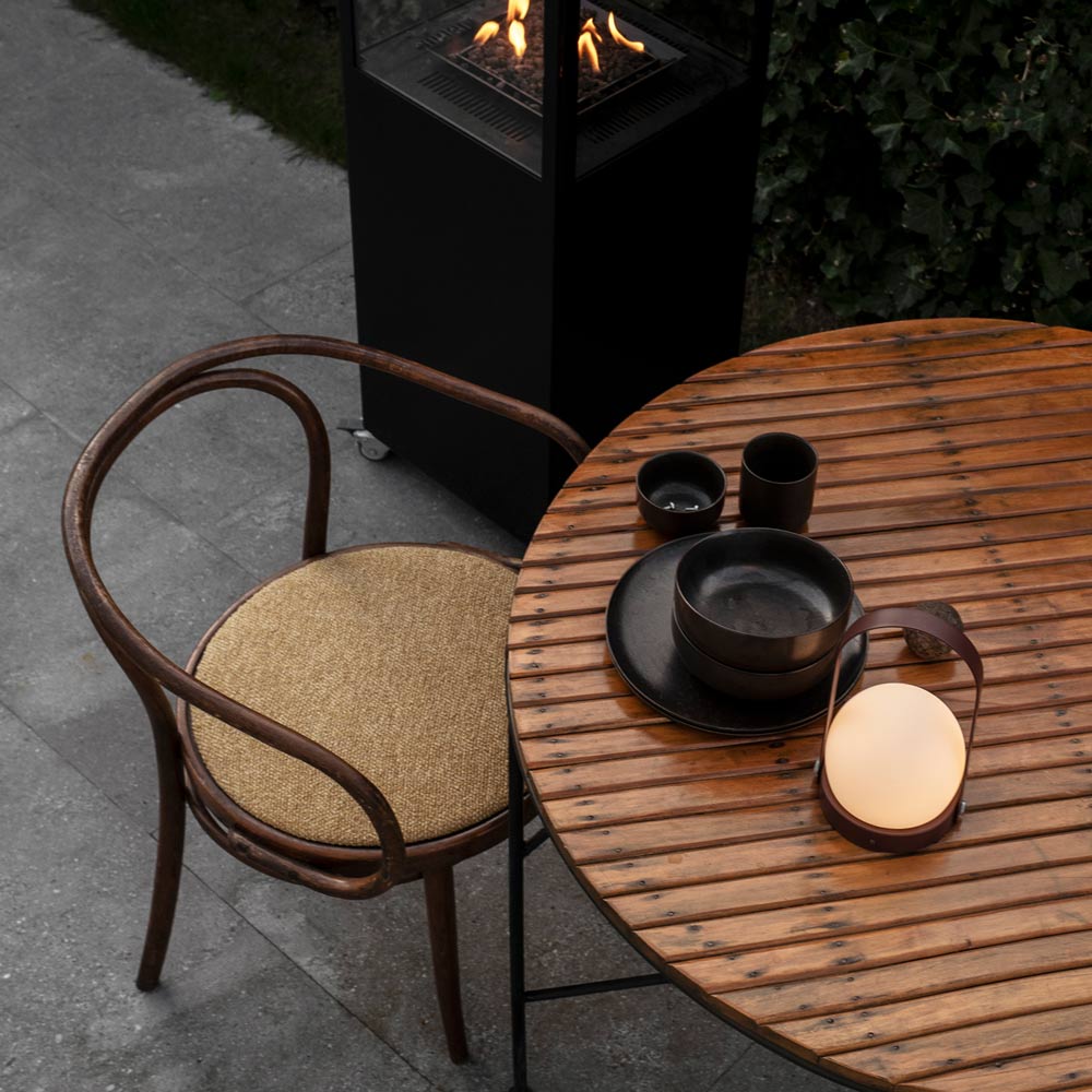 Carrie Outdoor LED Rechargeable Table Lamp in Outside Area.