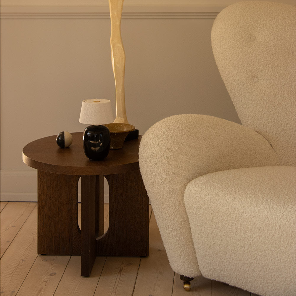 Torso LED Rechargeable Table Lamp in living room.