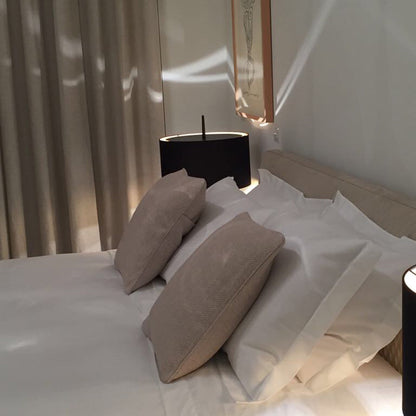 Lola T Table Lamp in bedroom.