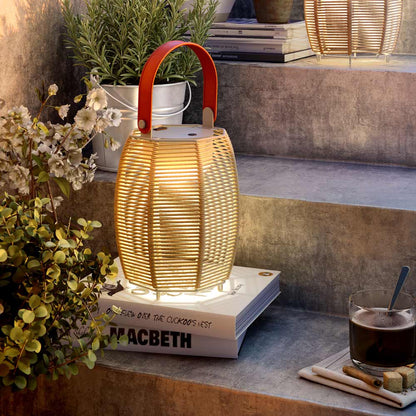 Tanit LED Table Lamp in Outside Area.