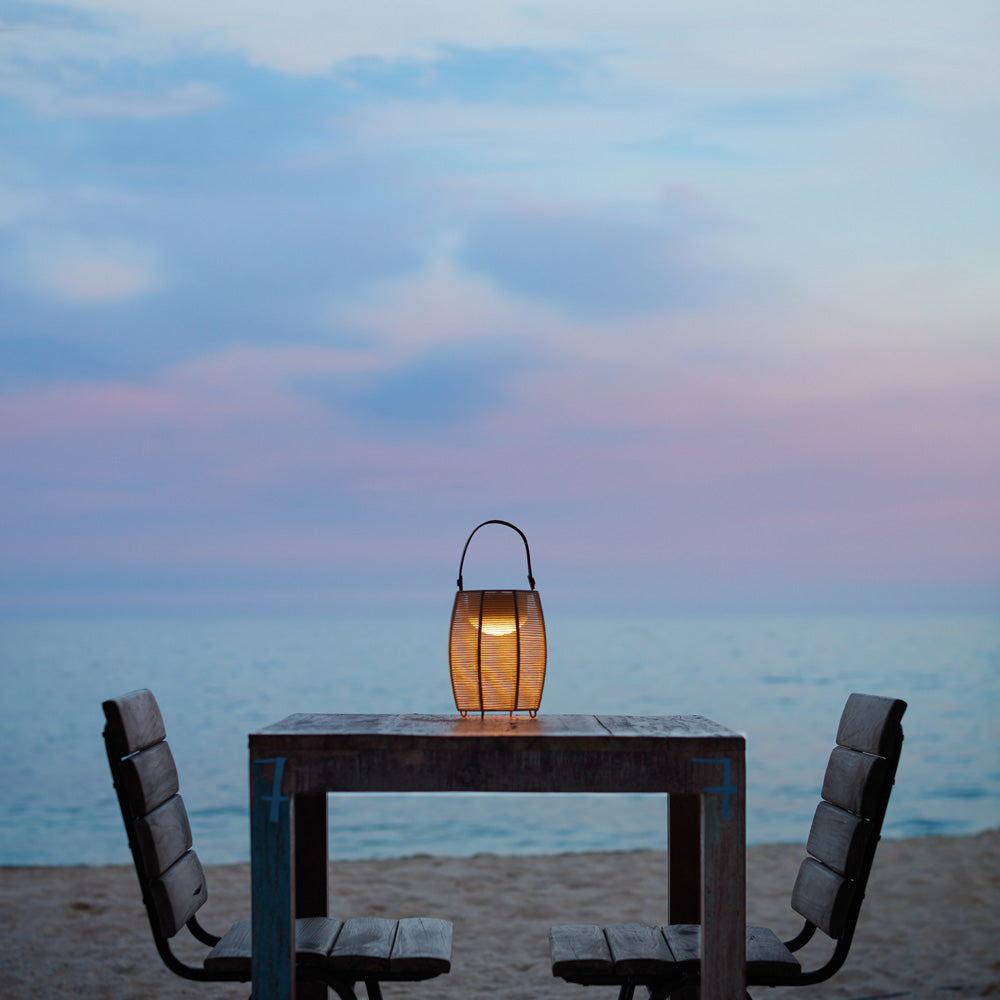 Tanit LED Table Lamp in Outside Area.