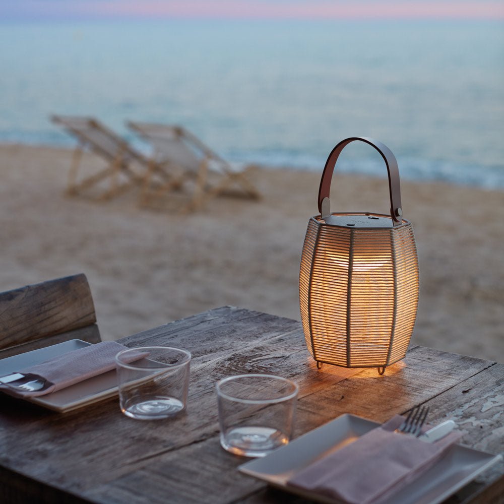 Tanit LED Table Lamp in Outside Area.