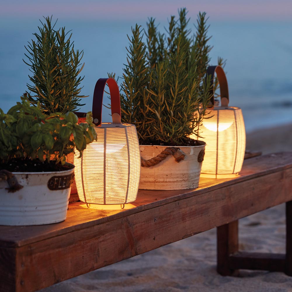 Tanit LED Table Lamp in Outside Area.