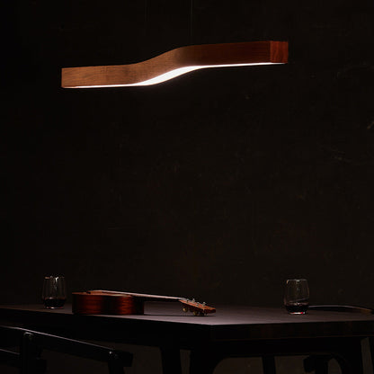 Camur LED Linear Pendant Light in dining room.