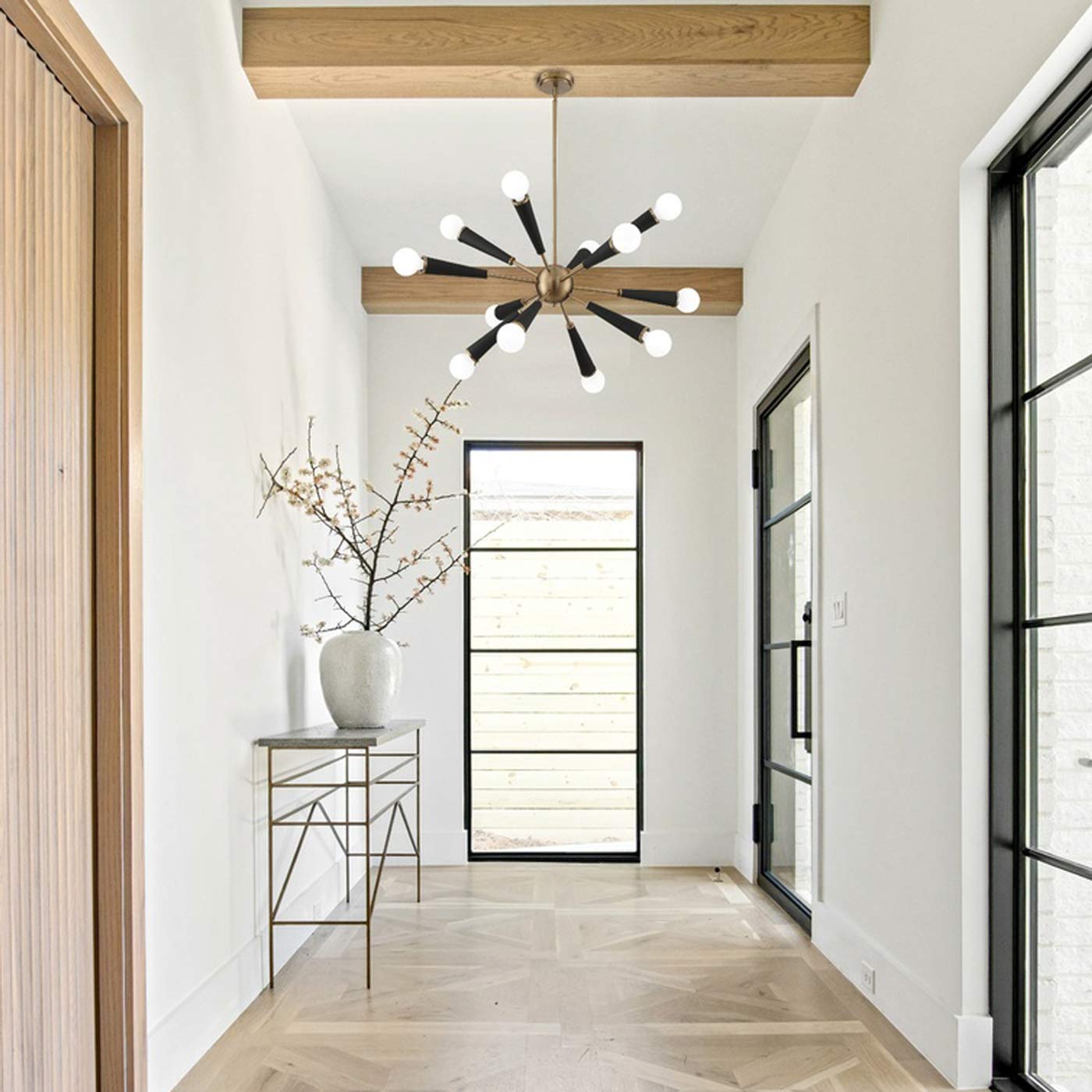 Zodiac Chandelier in hallway.