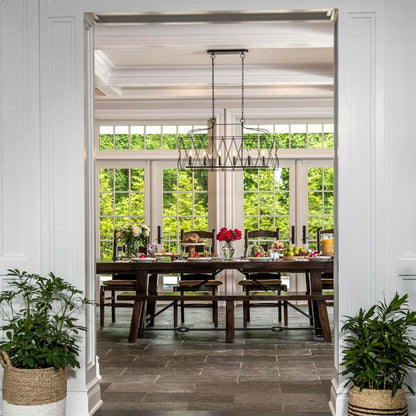 Zucca Linear Chandelier in dining room.
