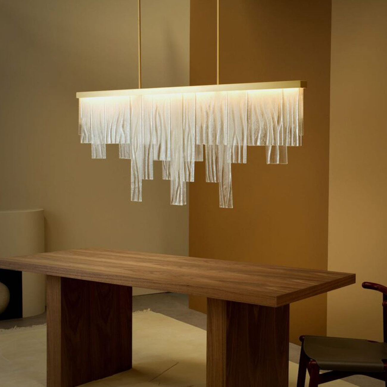 Cascata Long LED Chandelier in dining room. 
