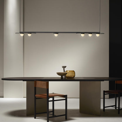 Modulo Linear LED Pendant Light in living room.