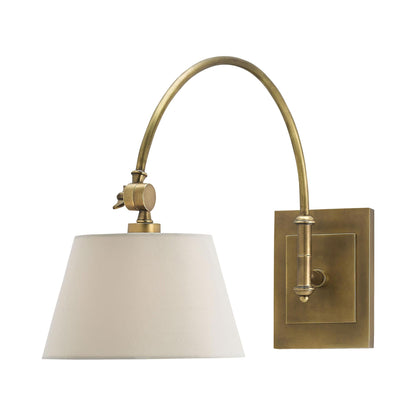 Ashby Swing Arm Wall Light in Antique Brass.