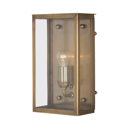 Royster Outdoor Wall Light in Antique Brass.