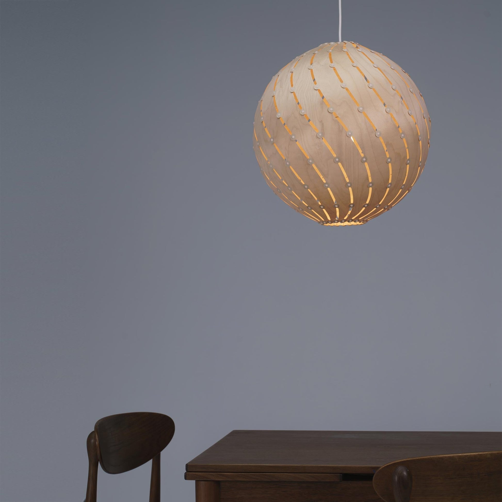 Ebb LED Bounce Pendant Light in dining room.