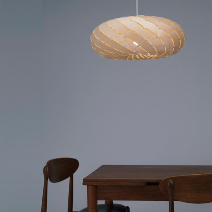 Ebb LED Swell Pendant Light in dining room.