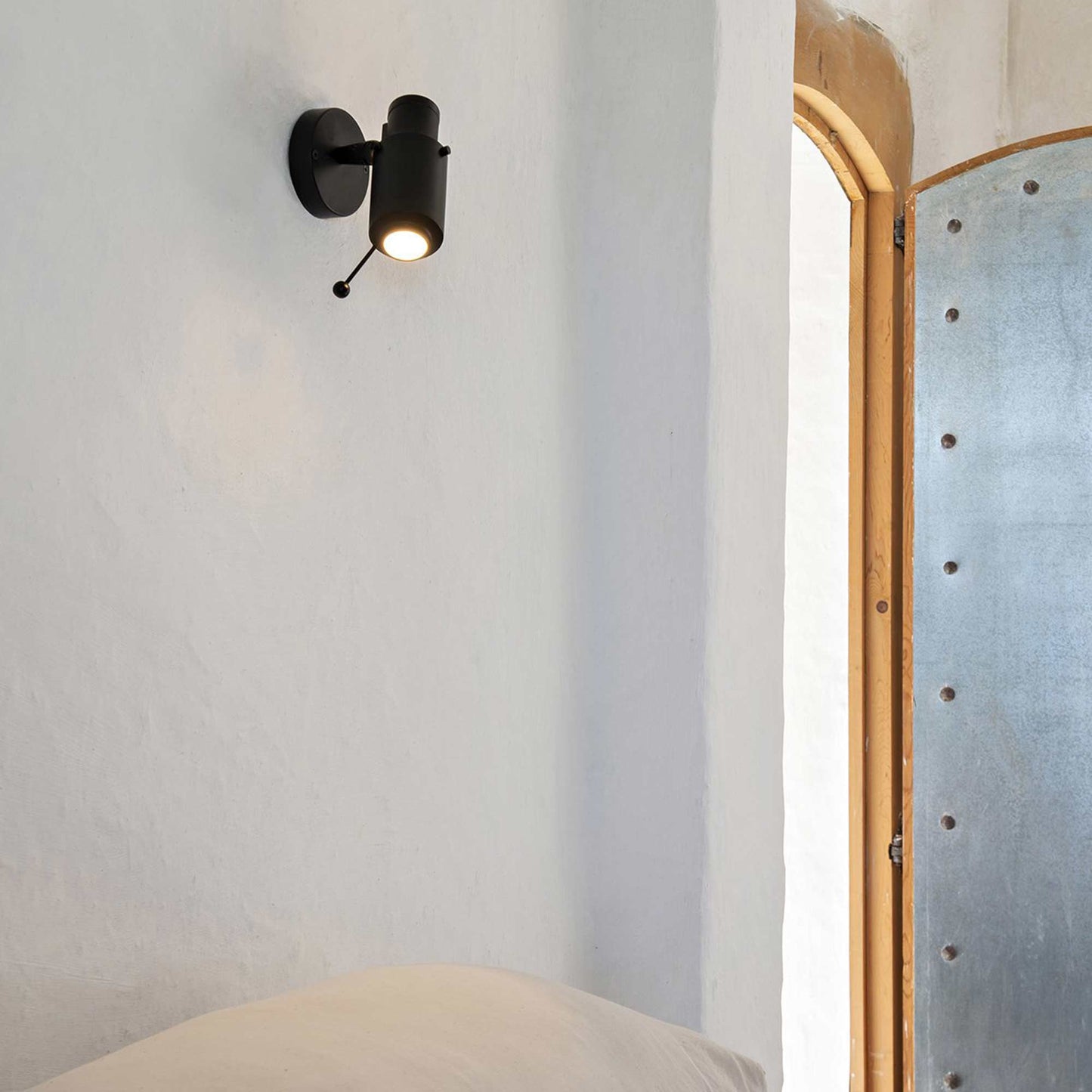 Biny Spot LED Wall Light in bedroom.