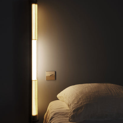 In The Tube 360° LED Wall Light in bedroom.