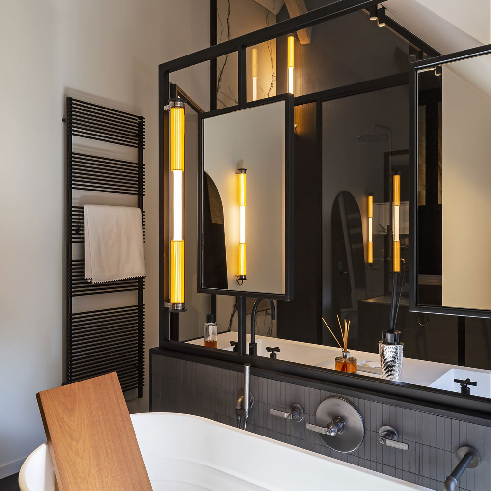 In The Tube 360° LED Wall Light in bathroom.