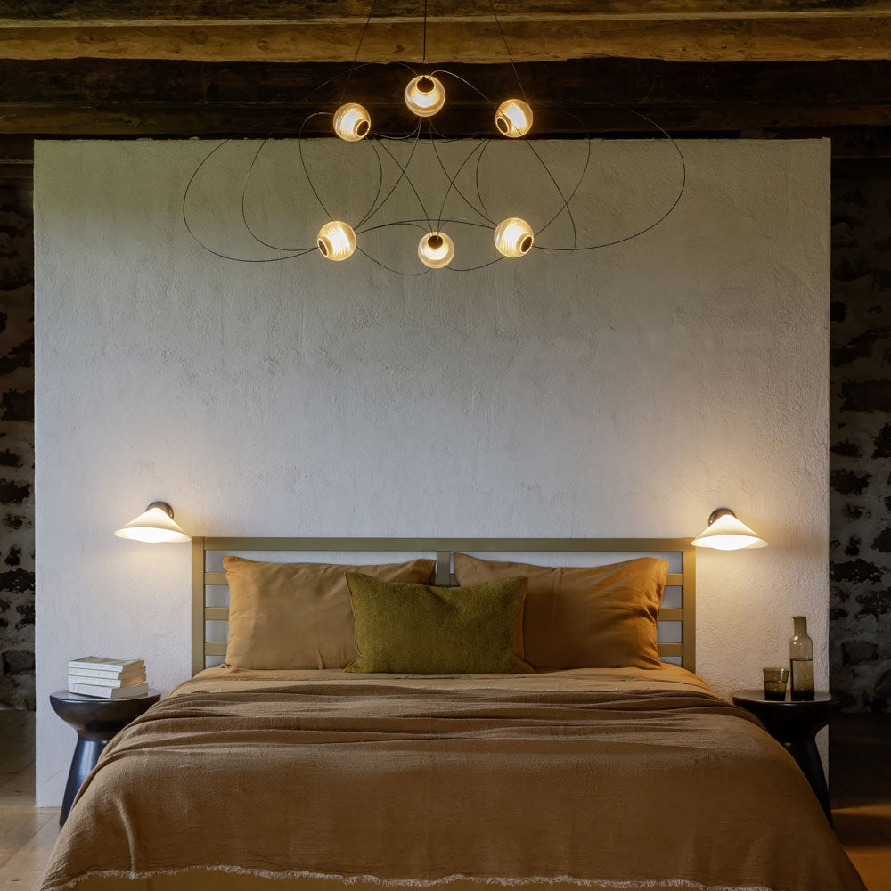Munari LED Chandelier in bedroom.