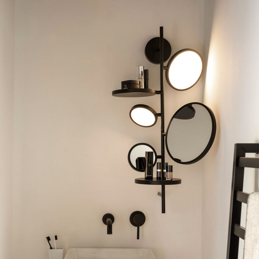 Tell Me Stories LED Wall Light in bathroom.